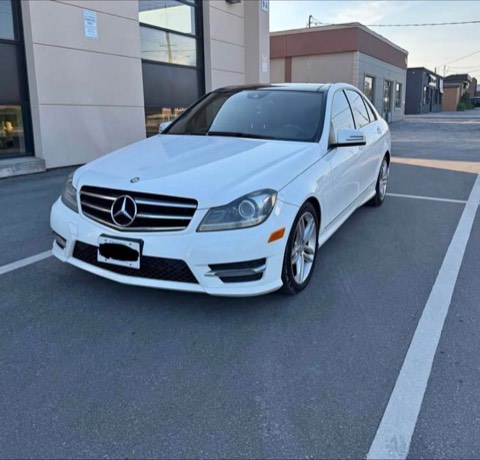 White Mercedes-Benz C300 — exterior — front left