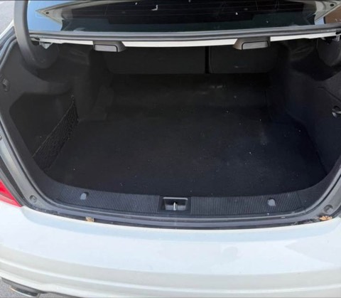 Open boot of a previously sourced white Mercedes-Benz C300