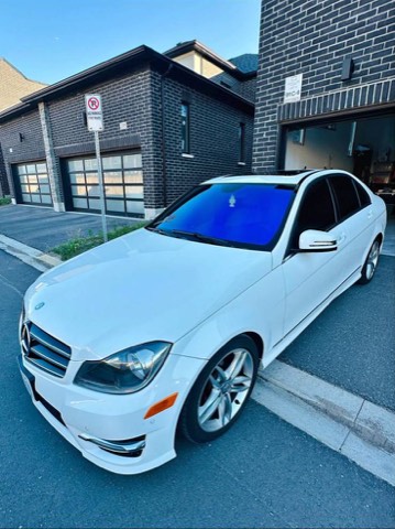 White Mercedes-Benz C300 — exterior — front left